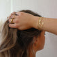 Schakel plat armband goud