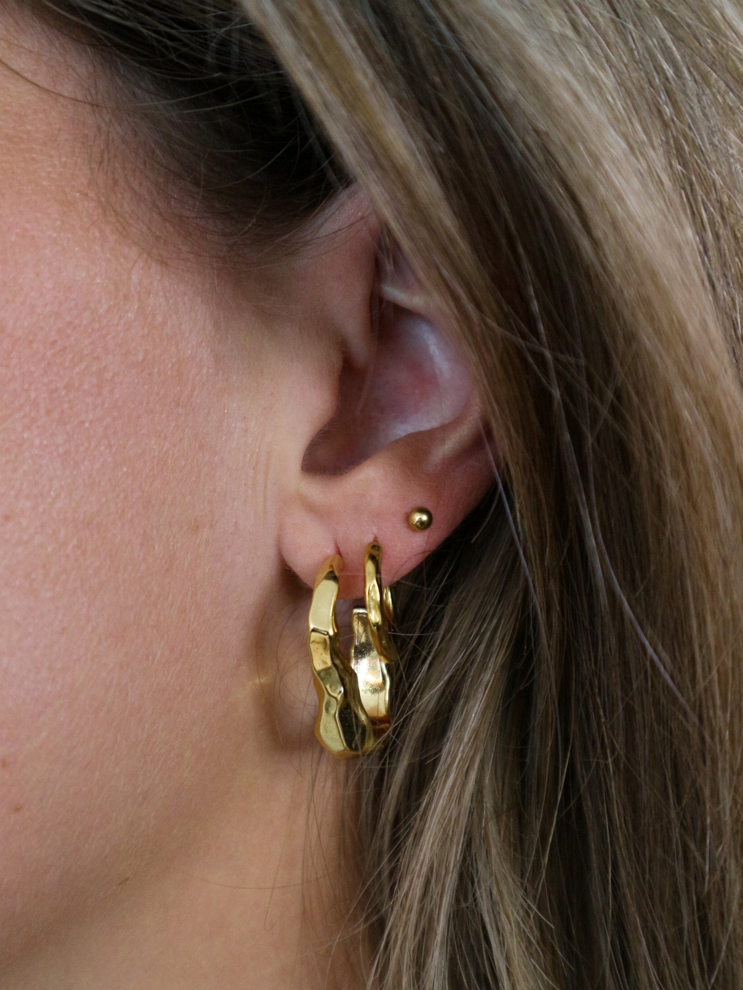 Asymmetrische oorbellen goud