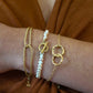 Twee ringen armband goud